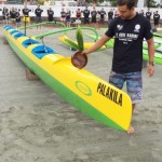 Cauê Serra performing canoe blessing ceremony 